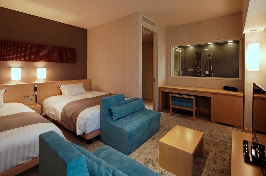 Cocochee Hotel Numazu Rum bild