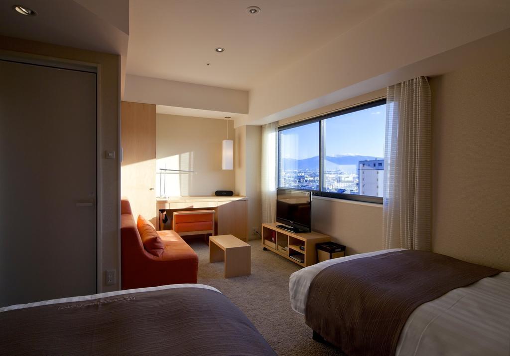 Cocochee Hotel Numazu Rum bild