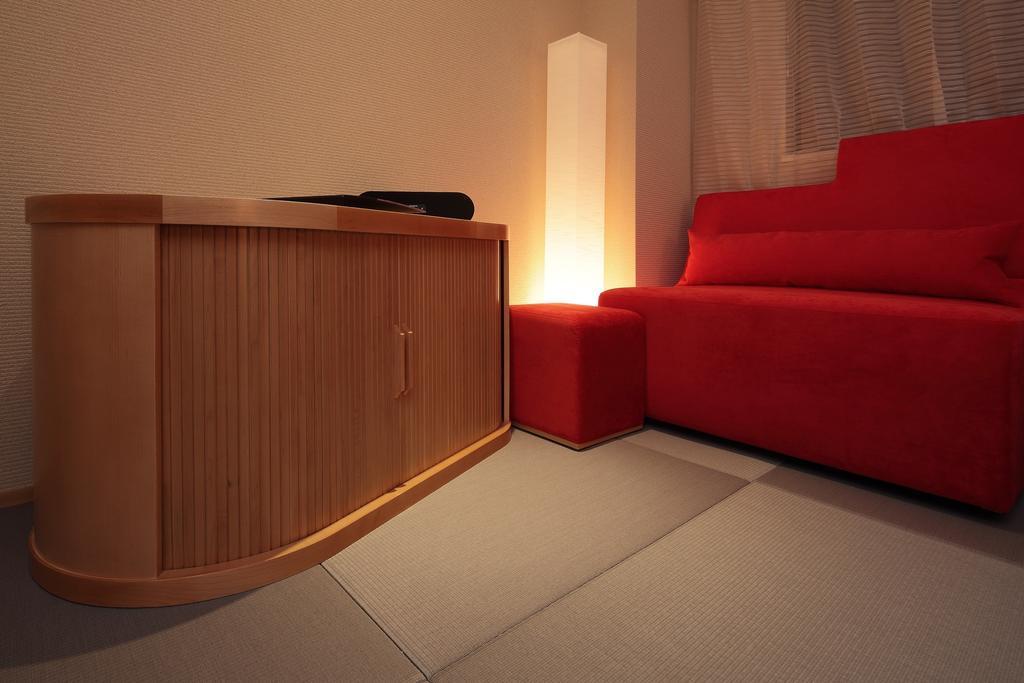 Cocochee Hotel Numazu Rum bild
